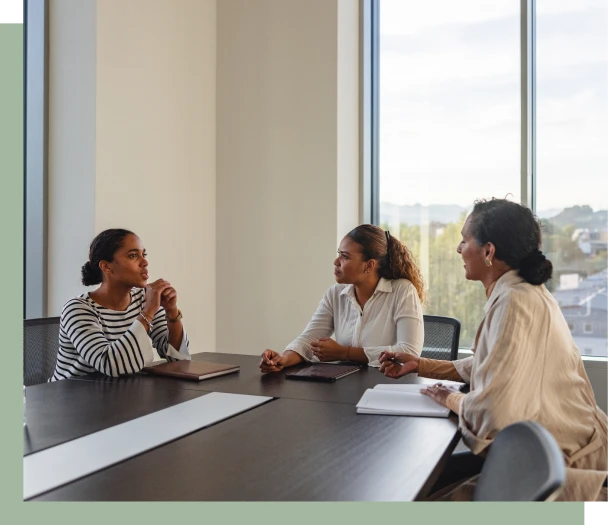 Professional discussion at conference table