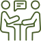 Two people talking at a table icon